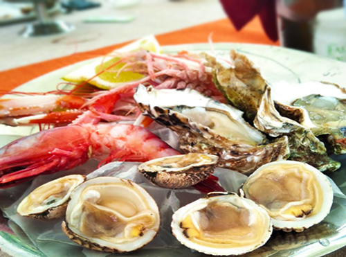 Mariscos crudos de Bari Puglia